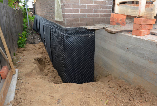 SJ Waterproofing Pros technician performing targeted Emergency Waterproofing assessment in Bartlett, TN